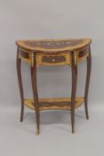 A LOUIS XVTH DESIGN INLAID HALF MOON TABLE with single drawer (plus another A/F) 2ft 4ins high.