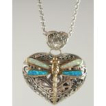 A SILVER GOLD PLATED OPAL DRAGONFLY LOCKET AND CHAIN.