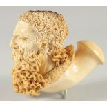 A SILVER MOUNTED MEERSCHAUM PIPE CARVED AS A MAN'S HEAD with a long beard. 14cm long, 12cm deep.