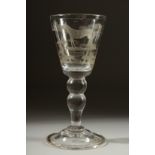 A LARGE HEAVY WINE GLASS engraved with a horse, a figure and a fox. 7ins high.