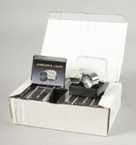 A BOX OF TWELVE JEWELLERS' LOUPES.