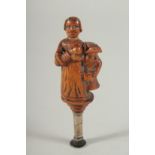 A RARE SLIGHTLY EROTIC CARVED PIPE TAMPLER, CIRCA. 1680 - 1700. A woman with a man at her side.