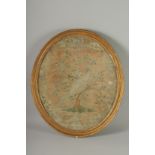 A REGENCY SILKWORK OVAL GILT FRAMED PICTURE of a pheasant in a tree. 19ins x 16ins.