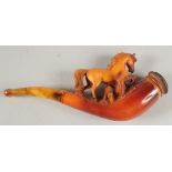 A GOOD MEERSCHAUM CHEROOT HOLDER CARVED WITH A HORSE. 8cm long, 5cm deep with an amber mouth piece.