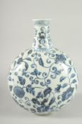 A CHINESE BLUE AND WHITE PORCELAIN MOON FLASK decorated with flower heads and scrolling vine. 31cm