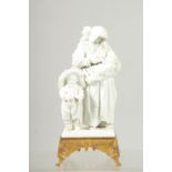 A GOOD VINCENNES SEVRES WHITE PORCELAIN GROUP of a mother, baby and child by her side, on a square