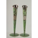 A PAIR OF GREEN ENAMEL FLUTED VASES. 6.75ins high.