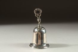 A SILVER HAND BELL. London 1898, TWO SMALL CAST FIGURES, 1.75ins and six silver circular dishes,