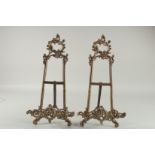 A PAIR OF BRASS PICTURE EASELS. 16ins high.