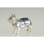 A NOVELTY SILVER PLATED FRENCH BULL DOG PIN CUSHION. 2.5ins long.