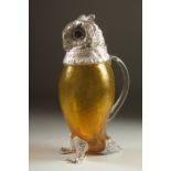 A GOOD YELLOW GLASS AND SILVER PLATED OWL CLARET JUG. 11ins high.