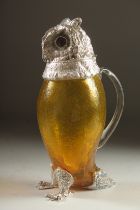 A GOOD YELLOW GLASS AND SILVER PLATED OWL CLARET JUG. 11ins high.