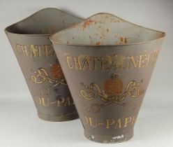 A PAIR OF GREY CHATEAU NEUF DU PAPE GRAPE CARRIERS. 24ins high.