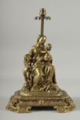 A GOOD 19TH CENTURY BRONZE LAMP formed as a mother and two children. 14ins high.