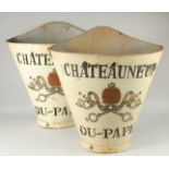 A PAIR OF GREY CHATEAU NEUF DU PAPE GRAPE CARRIERS. 24ins high.