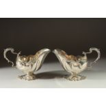 A SUPERB PAIR OF SILVER SAUCE BOATS. London 1901. Weighs 30ozs.