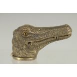 A NOVELTY BRASS CROCODILE VESTA CASE. 2.5ins long.