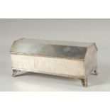 A GOOD SILVER PLATED DESK INK CASKET with rising top and fitted interior. 9ins long.