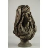 A GOOD LARGE SPELTER ARAB BUST OF A MAN on a circular base. 22ins high.