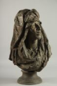 A GOOD LARGE SPELTER ARAB BUST OF A MAN on a circular base. 22ins high.