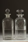 A PAIR OF GEORGIAN SQUARE DECANTERS AND STOPPERS. 9ins high.