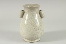 A Chinese crackle glazed twin handled vase. 6.5ins high.