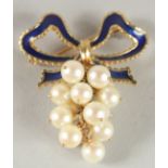 A 14CT GOLD BLUE ENAMEL AND PEARL BROOCH.