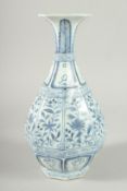 A CHINESES BLUE AND WHITE OCCTANGONAL YUHUCHIMPING VASE, painted with panels of flora. 28ins high.