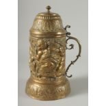 A LARGE 18TH - 19TH CENTURY CONTINENTAL FLAGON with cupids in relief. 13ins high.