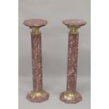 A PAIR OF MARBLE CLUSTER COLUMNS. 3ft 3ins high.