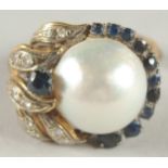 A 14CT GOLD LARGE PEARL, SAPPHIRE AND DIAMOND RING.