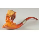 A SUPERB CARVED MEERSCHAUM PIPE "HEAD OF NAPOLEON". 11cm deep with curving amber mouthpiece, 25cm