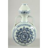 A Chinese blue and white moon flask. 10ins high.