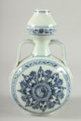 A Chinese blue and white moon flask. 10ins high.