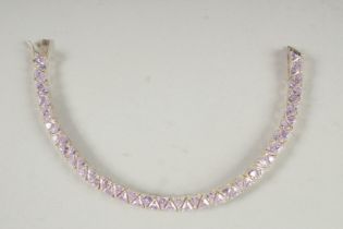 A SILVER GILT & CZ BRACELET.