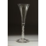 A GEORGIAN GLASS with long tapering plain bowl with white air twist stem. 7.5ins high.