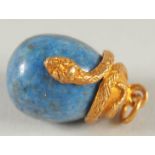 A 14CT GOLD RUSSIAN BLUE EGG PENDANT with a snake.