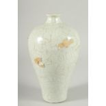 A Chinese Meiping shaped vase with moulded decoration. 9ins high.