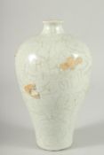 A Chinese Meiping shaped vase with moulded decoration. 9ins high.