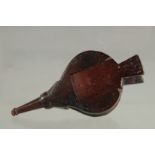 A 19TH CENTURY WELSH TREEN SNUFF BOX as a pair of bellows. 5ins long.