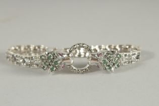 A SILVER EMERALD MARCASITE PANTHER BRACELET.