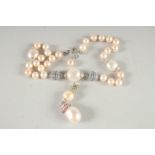 A SUPERB 18CT WHITE GOLD PEARL, DIAMOND AND SAPPHIRE NECKLACE.