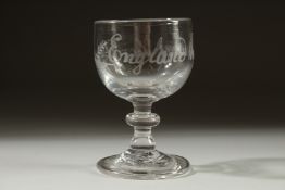 A SMALL GEORGIAN GLASS engraved "England has done it's duty" 3.25ins high.