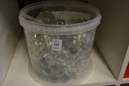 A quantity of clear glass spheres etc.
