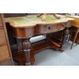 A Victorian mahogany Duchess style writing table.