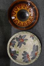 Two pottery dishes.