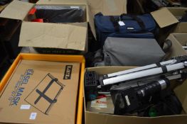 A quantity of camera equipment to include a tripod, camera bags, dark room equipment etc.