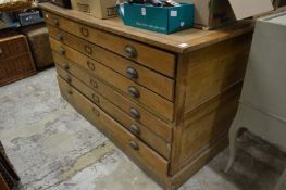 An oak two section six drawer plan chest.