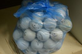 A bag of fifty Callaway golf balls.