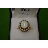 A 9ct gold and opal cluster ring, size O.
